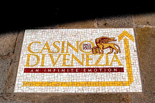 Casino-inspired event place settings arranged before guests arrive